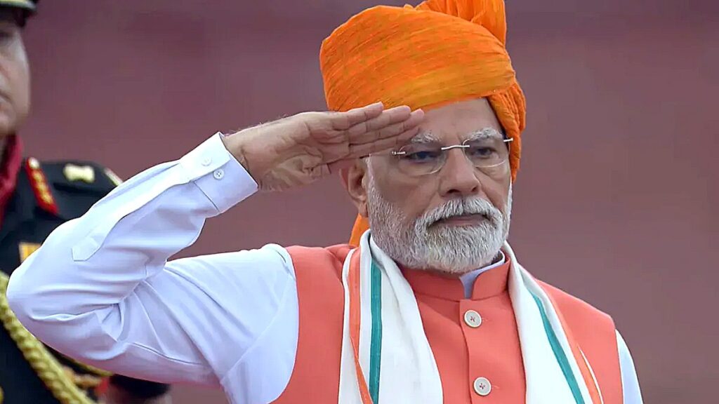 Prime Minister Narendra Modi salutes during Independence Day 2025 celebrations at Red Fort in New Delhi