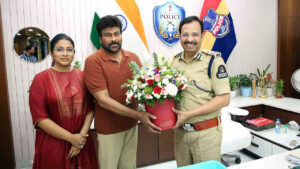 Megastar Chiranjeevi meets Hyderabad Police Commissioner VC Sajjanar and greets him with a bouquet