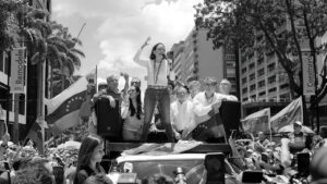 Maria Corina Machado standing with supporters in Venezuela – symbol of courage, peace, and democracy