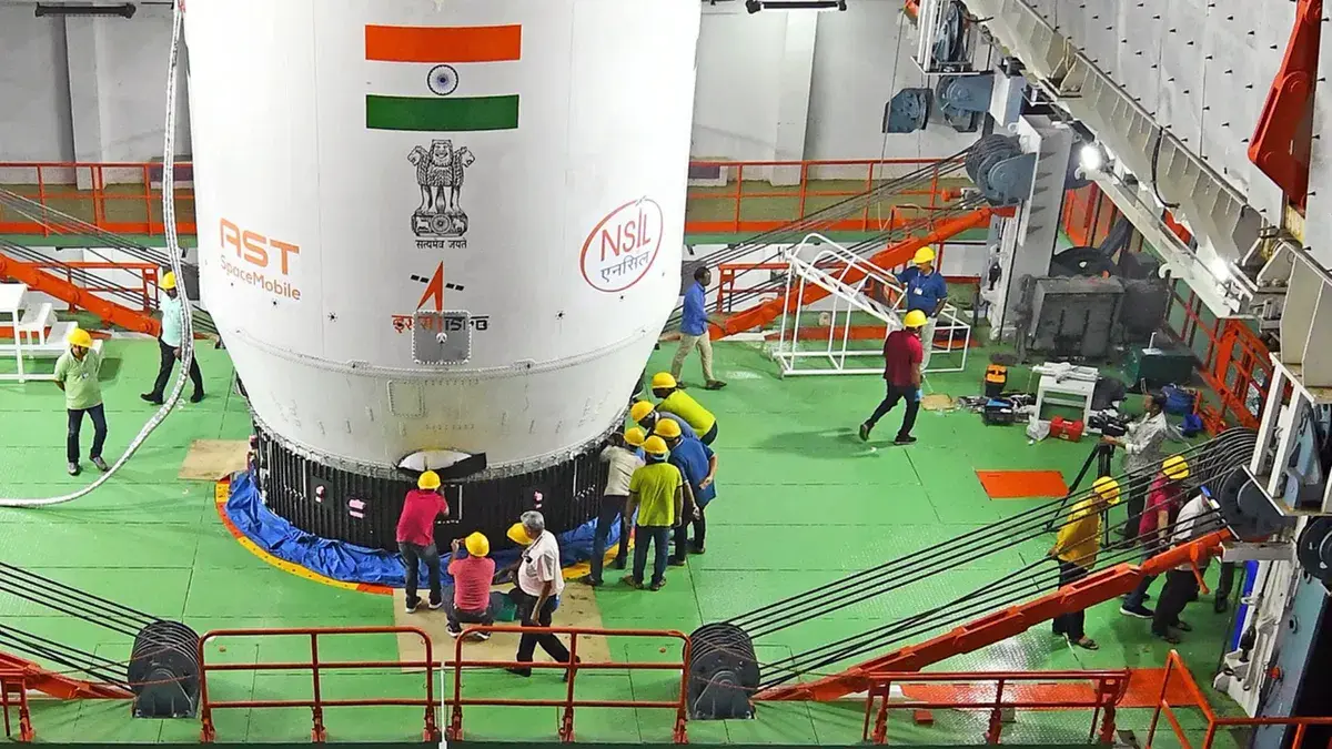 Engineers integrating BlueBird Block-2 communication satellite with ISRO LVM3 rocket at Sriharikota