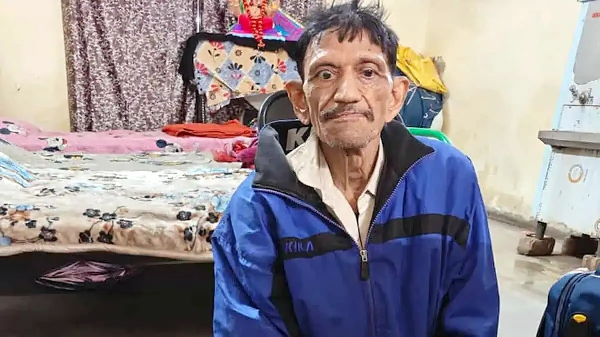 Mangilal, a physically disabled man from Indore, seated inside a shelter home after being rescued during an anti-beggary drive.