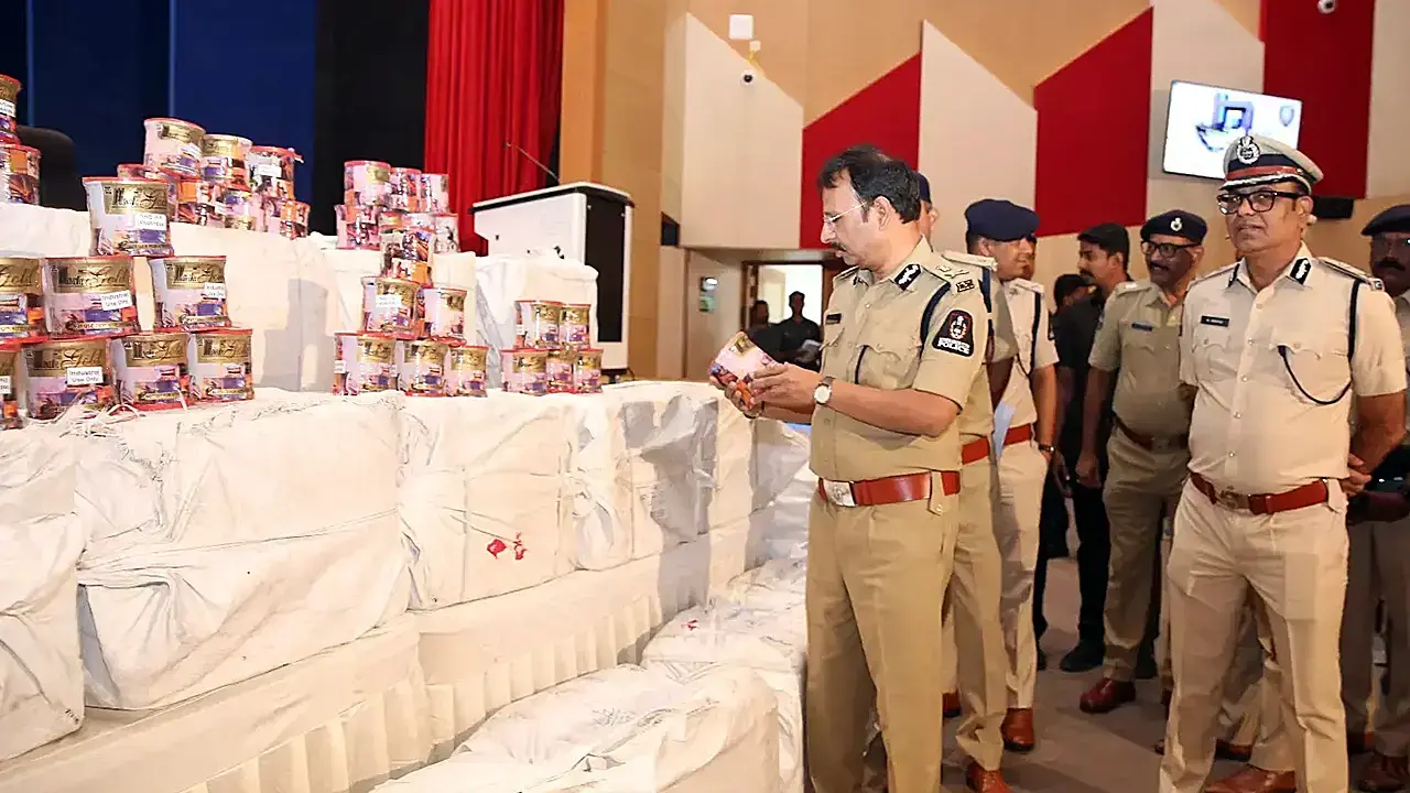 Senior Hyderabad police officials examining large stacks of seized Chinese manja reels during enforcement drive