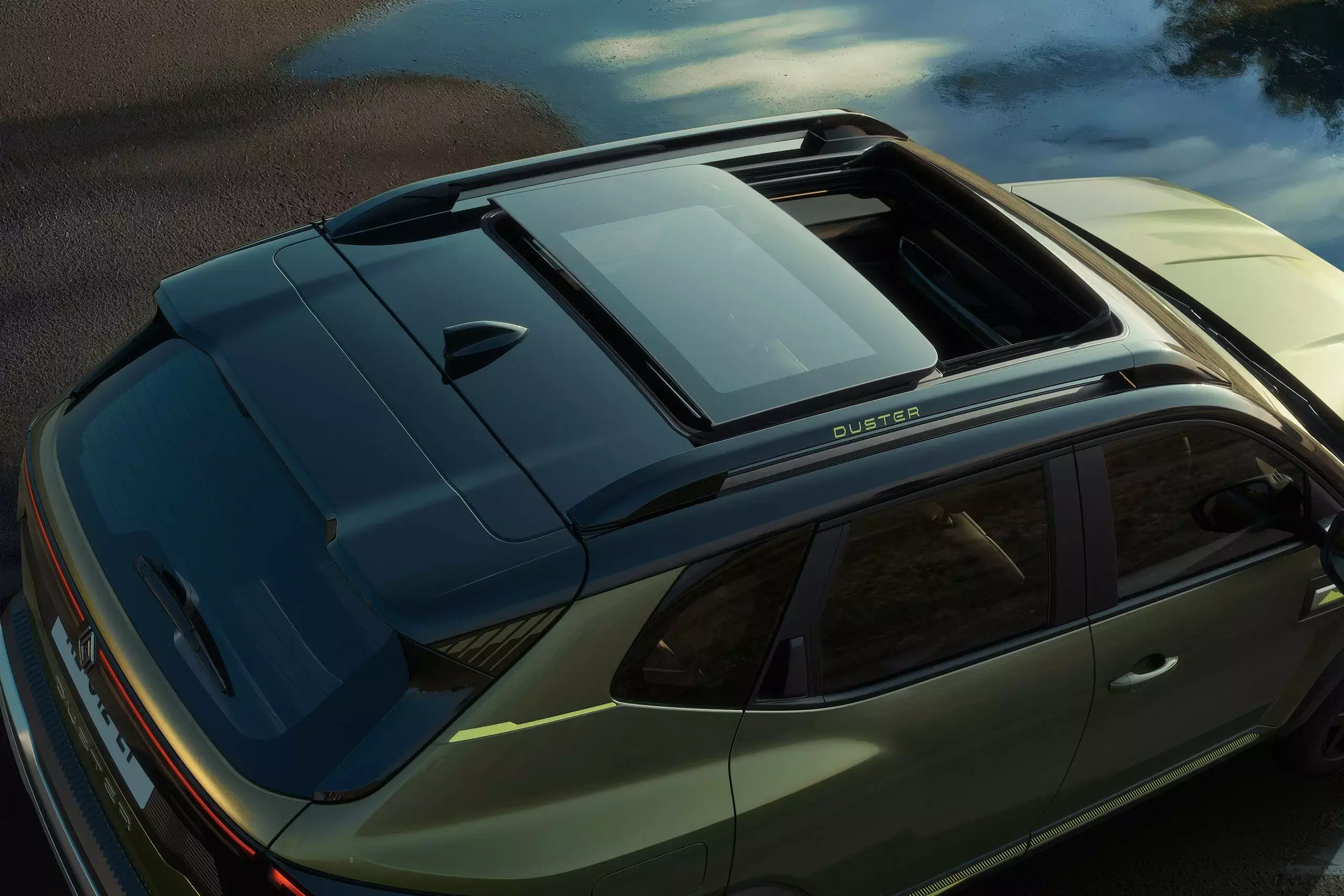 2026 Renault Duster panoramic sunroof and roof rails top view exterior design