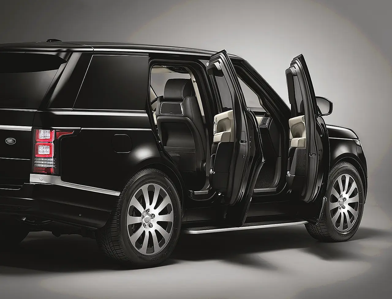 Range Rover Sentinel with open doors showing heavy armoured structure and security design