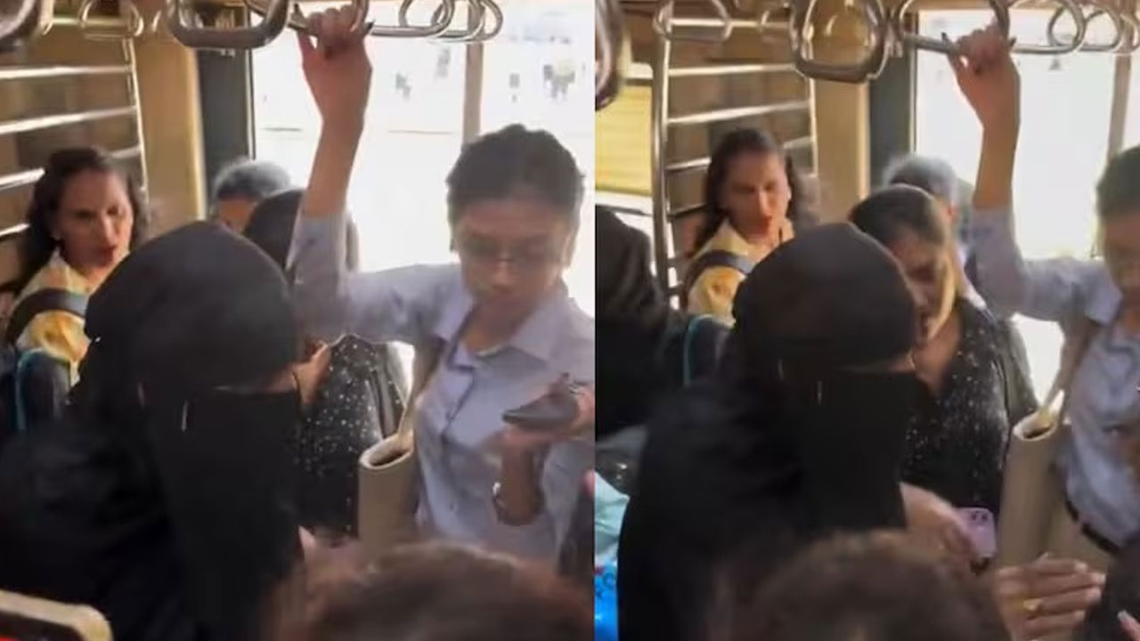 Man wearing burqa caught in mumbai local train