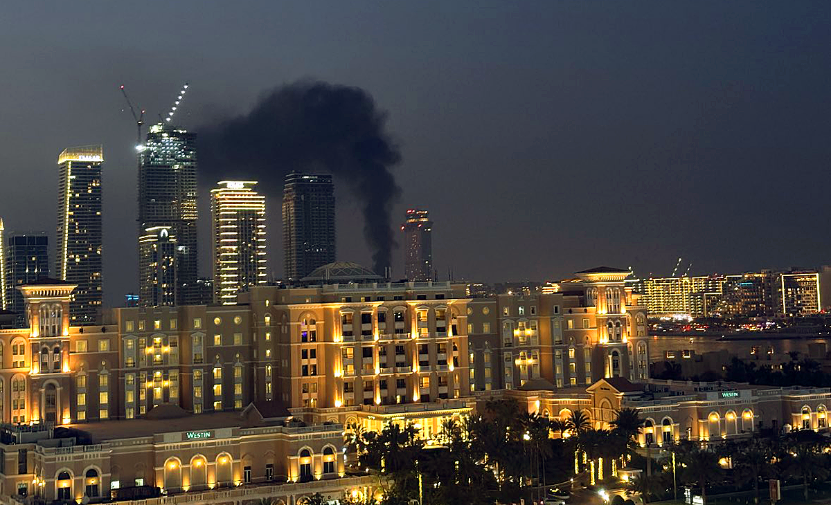 Iran missile strike near Dubai skyline during Middle East war tensions