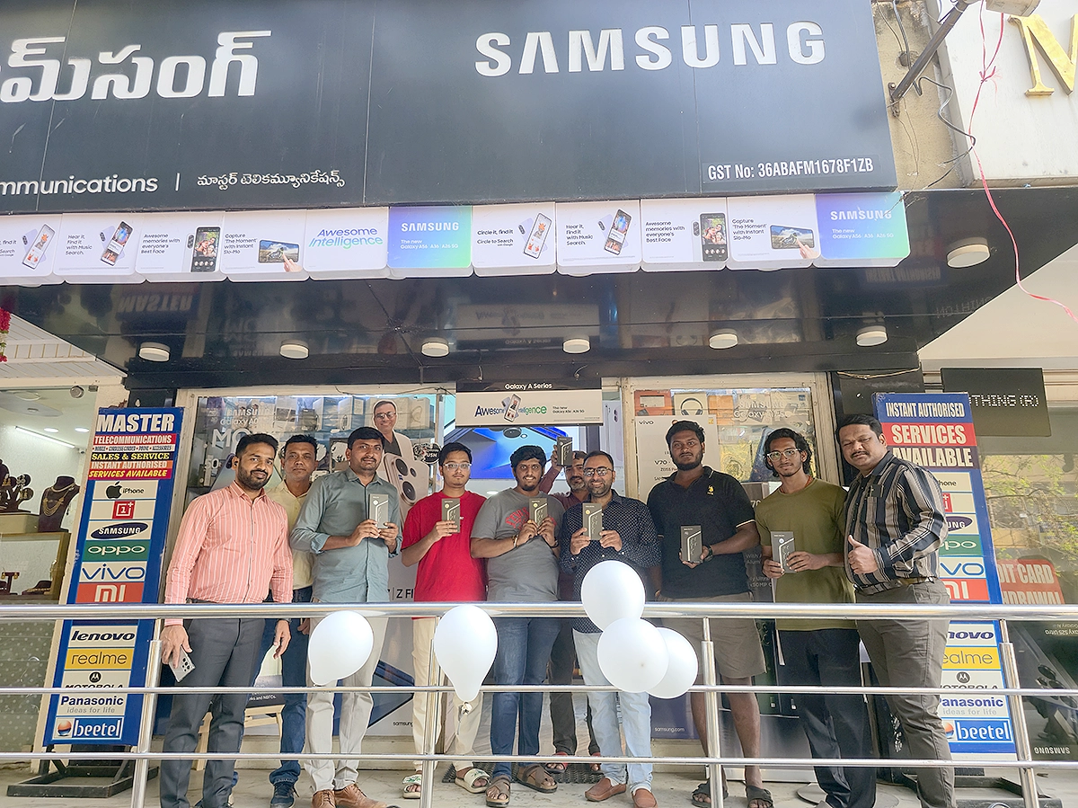 Samsung Galaxy S26 series customers posing with their phones at Master Telecommunications store Hyderabad