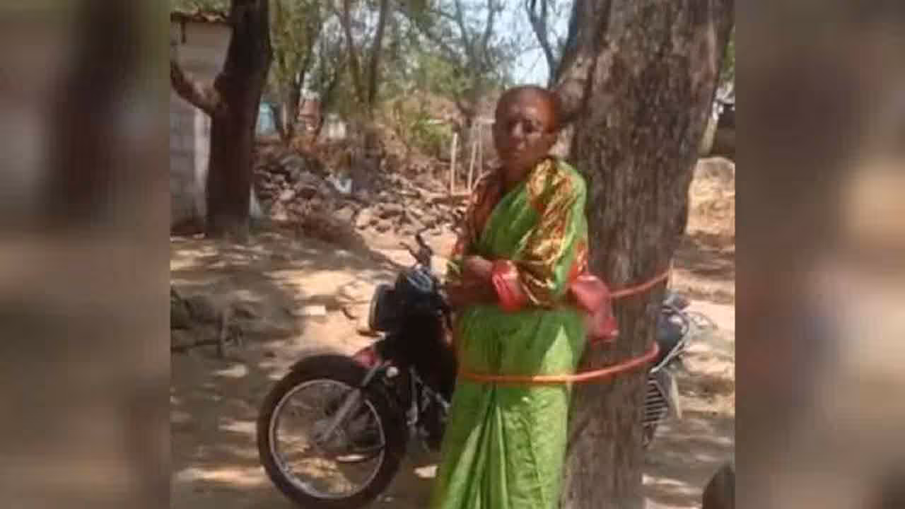 Anganwadi Teacher | భ‌ర్త చేసిన త‌ప్పుకు.. అంగ‌న్‌వాడీ టీచ‌ర్‌ను చెట్టుకు క‌ట్టేశారు
