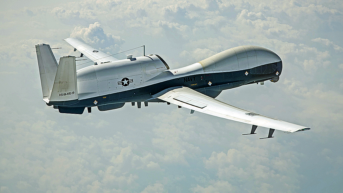 MQ-4C Triton US Navy surveillance drone in flight high altitude maritime UAV