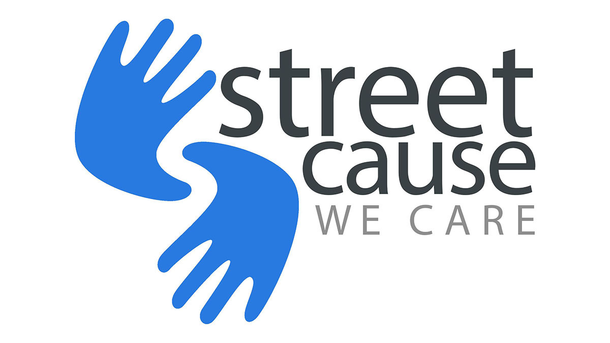 స్ట్రీట్ కాజ్ ఎన్జీఓ లోగో మరియు ‘We Care’ సందేశం