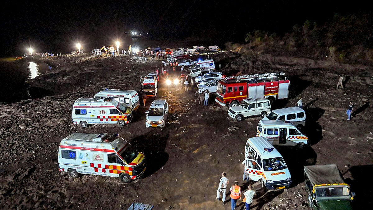 Emergency rescue teams and ambulances deployed at Bargi Dam accident site at night