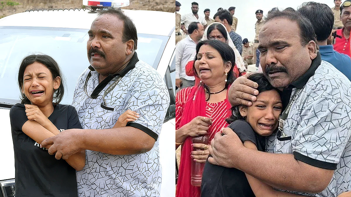 Survivor family member consoling a crying child after Bargi Dam boat tragedy