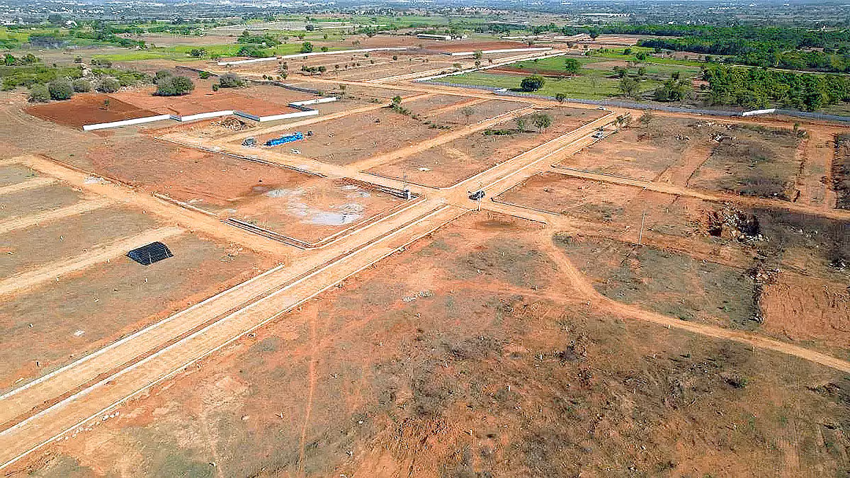 Aerial view of unapproved land layouts and plotted development in rural Telangana region