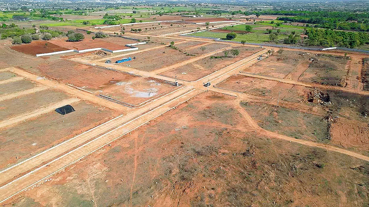 Aerial view of unapproved land layouts and plotted development in rural Telangana region