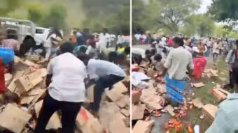 లిక్కర్ వ్యాన్ బోల్తా..నిమిషాల్లోనే మందు సీసాలు స్వాహా!